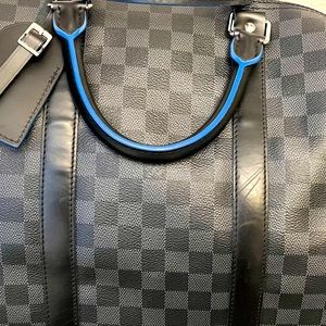 Good condition LV keepall 55 Graphite neon with Blue lining. Comes with dust bag